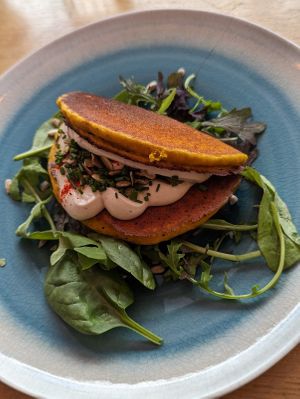 Pancake starter- savory, and that cashew cream 🤌 at Le Potager de Charlotte in Paris