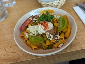 Husband's Rigatoni dish- can't we all agree the sauce makes the meal, tomatoe suace, cashew cream, and pesto 🤤 at Le Potager de Charlotte in Paris