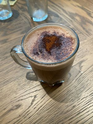 Hot chocolate with oat milk and cocoa powder. Cinnamon is also an option as is soy milk.  at Le Potager de Charlotte in Paris