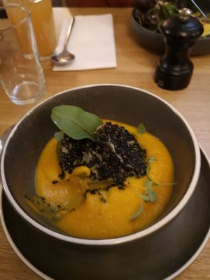 Artichokes, lack sesame and cartot jus. at Le Potager de Charlotte in Paris