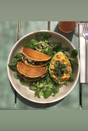 Chickpea pancakes stuffed avocado “kalanamak" at Le Potager de Charlotte in Paris