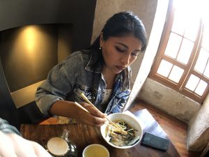 Practicing with chopsticks   at El Buda Profano in Arequipa