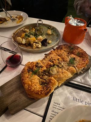The roasted cauliflower and fennel flatbread are so yummy! Also, great wine choices. at Little Pine in Los Angeles