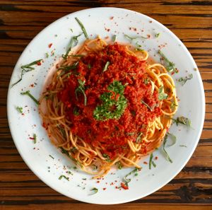 Cooked Wholegrain Pasta with Cooked to Order Fresh Tomatoes, Gogi Berries and Basil at Alice's Restaurant  in Chiang Mai
