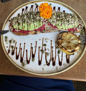 Sliced Avo on toast - a creatively presented Vegan option   at The Glass Den in Coburg