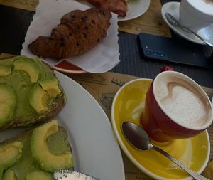 Avocado toast without egg, vegan chocolate croissant and oat milk latte   at La Licata in Rome