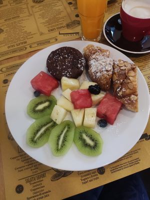 Vegan breakfast with coffee and orange juice at La Licata in Rome