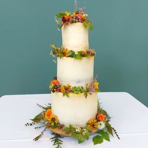 Semi-naked vegan wedding cake in autumnal theme at The Kind Cake Co in Hebden Bridge