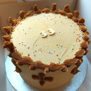 Biscoff cake, three layers of sponge with Biscoff buttercream and piping. Yum! at The Kind Cake Co in Hebden Bridge