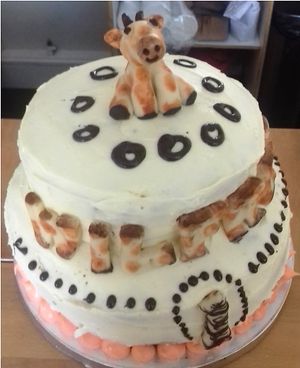 Birthday cake with animal character  at The Kind Cake Co in Hebden Bridge