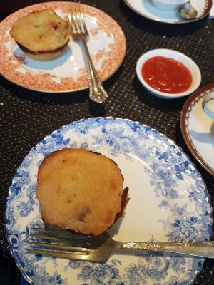 Pie with sauce at The Kind Cake Co in Hebden Bridge