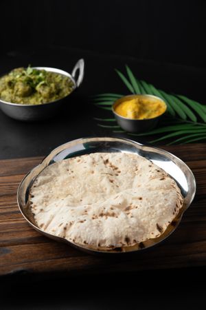 Phulka Roti served steamy hot at Swaad Art of Saatvik Food. - Desker Rd in Central Singapore