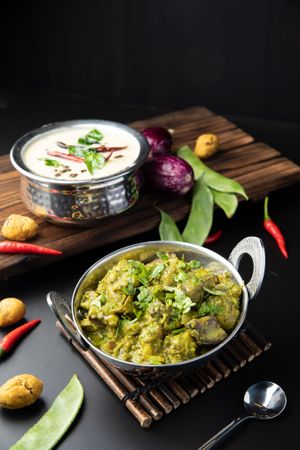 Undhiyu and Gujarati Kadhi. Our customers' favourite at Swaad Art of Saatvik Food. - Desker Rd in Central Singapore