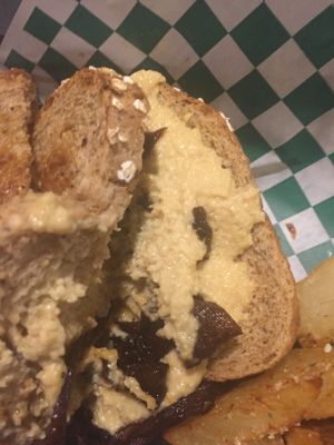 Vegan grilled cheese with vegan bacon at Dancing Avocado in Daytona Beach