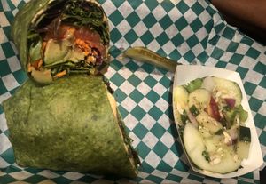 Avo hummus wrap with side cucumber salad at Dancing Avocado in Daytona Beach