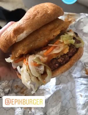 Vegan onion ring on my vegan burger 🤤  at Epik Burger in Jacksonville