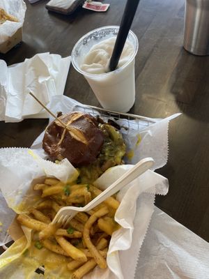Cheese fry’s, Philly cheesesteak, vanilla milkshake all vegan, entirely delicious!   at Epik Burger in Jacksonville