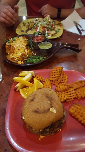eggplant burger, cheese fries and nachos at Go Vegan Cafe in Las Vegas