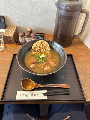 Curry udon with veggie tempura and soy chunks  at Mimikou in Kyoto