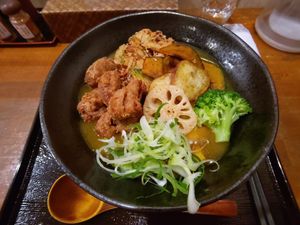 Curry udon with vegetable tempura and tofu nuggets at Mimikou in Kyoto