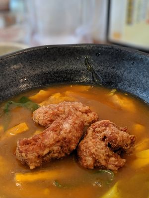 Tofu curry udon with soy karaage at Mimikou in Kyoto