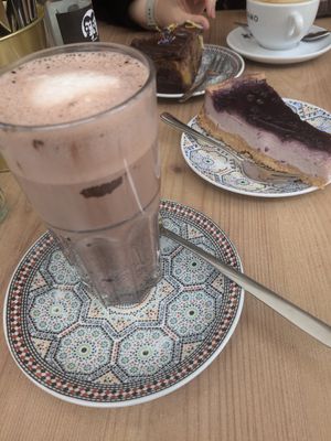 Kakao with blueberry cake at Fancy Foods in Wuppertal
