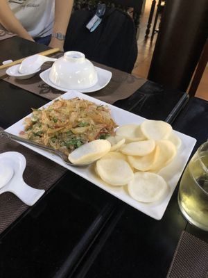 Pomelo salad and vegan crackers at San May Vegetarian in Hue