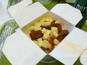 Pasta with tomato sauce, vegan chorizo and vegan cheese at Vegie Bar in Paris