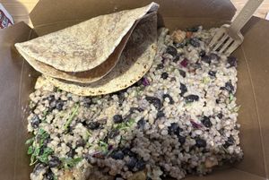 Burrito bowl special with cashew queso 🌱🤍  at Naked Lunch in Herndon