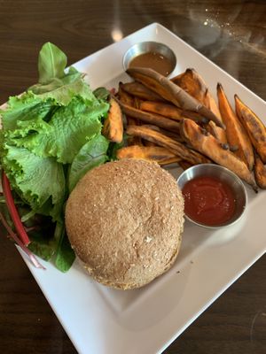 Jackfruit bbq sandwich with sweet potato fries and mixed greens  at GreenFare Organic Cafe in Herndon