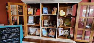 part two of inhouse book library and for sale WFPB references and cookbooks. at GreenFare Organic Cafe in Herndon