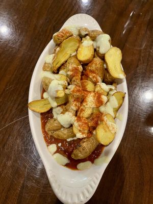 Organic baked potatas bravas appetizer.   at GreenFare Organic Cafe in Herndon