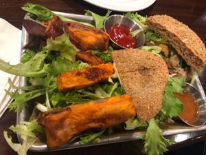 Jackfruit sandwich with sweet potato fries 😋 at GreenFare Organic Cafe in Herndon