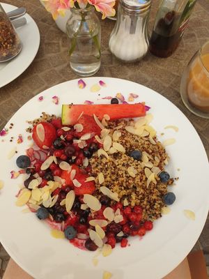 Quinoa with warm fruit and almonds at You're Welcome in Berlin