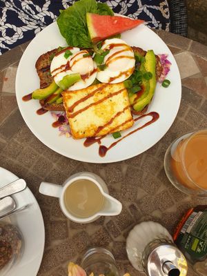 Not vegan: Avocado toast with poached eggs and cheese at You're Welcome in Berlin