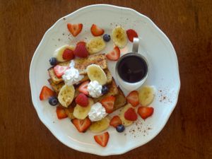 French Toast made with house baked, gluten-free bread. Served all day Saturday & Sunday. at Clovermint Cafe and Market in Dania Beach