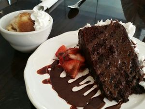 chocolate cake with a side of banana ice cream at Clovermint Cafe and Market in Dania Beach