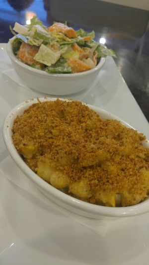 mac n cheese with side Caesar salad at Clovermint Cafe and Market in Dania Beach