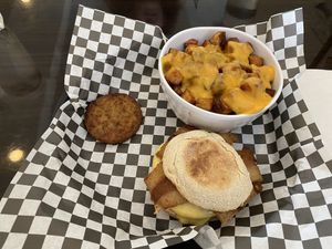 Freakin McMuffin with Sausage, egg, cheese and extra patty, because...why not?! (Plant based) at Clovermint Cafe and Market in Dania Beach