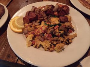 Garden tofu scramble omelette with home fries. at Backwater in Melbourne
