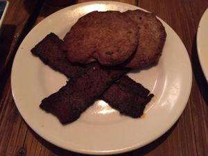 Vegan sausage and bacon (gimme lean and benevolent bacon). at Backwater in Melbourne