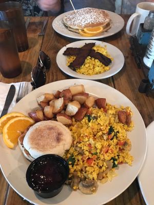 Garden veggie tofu scramble, plain tofu scramble with vegan bacon, vegan pancakes  at Backwater in Melbourne
