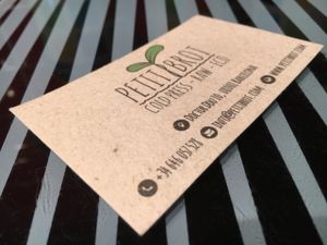 Business card at Petit Brot - Cold Press Raw Eco in Barcelona