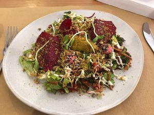 raw falafel and duo salad daily lunch menu item at Petit Brot - Cold Press Raw Eco in Barcelona
