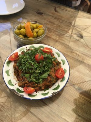 Foul with marinated zeitun achbar  at Shams El Balad Cafe in Amman