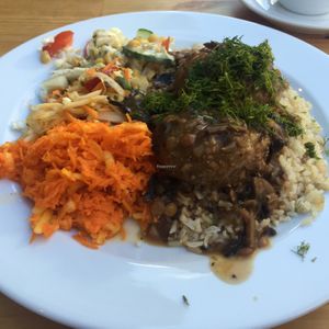 soya cutlets with mushroom sauce, salad and rice at Vege Bar in Gdansk