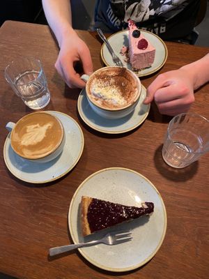 Raspberry and New York cheesecake, cappuccino and hot chocolate  at Kaf in Copenhagen