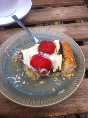 I couldn't resist several bites before taking a bite of the exquisite Danish traditional cake - jordbærtærte med mazarinbund! at Kaf in Copenhagen