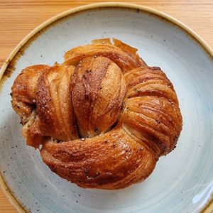 Cardamom bun. Just look at this glorious, sticky, sweet thing. Isn't it beautiful? at Kaf in Copenhagen