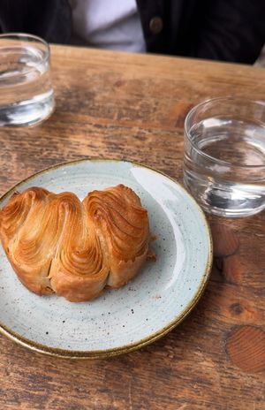 Super tasty vegan plain croissant that was a veeg welcome and  pleasing snack on our journey 😁  at Kaf in Copenhagen